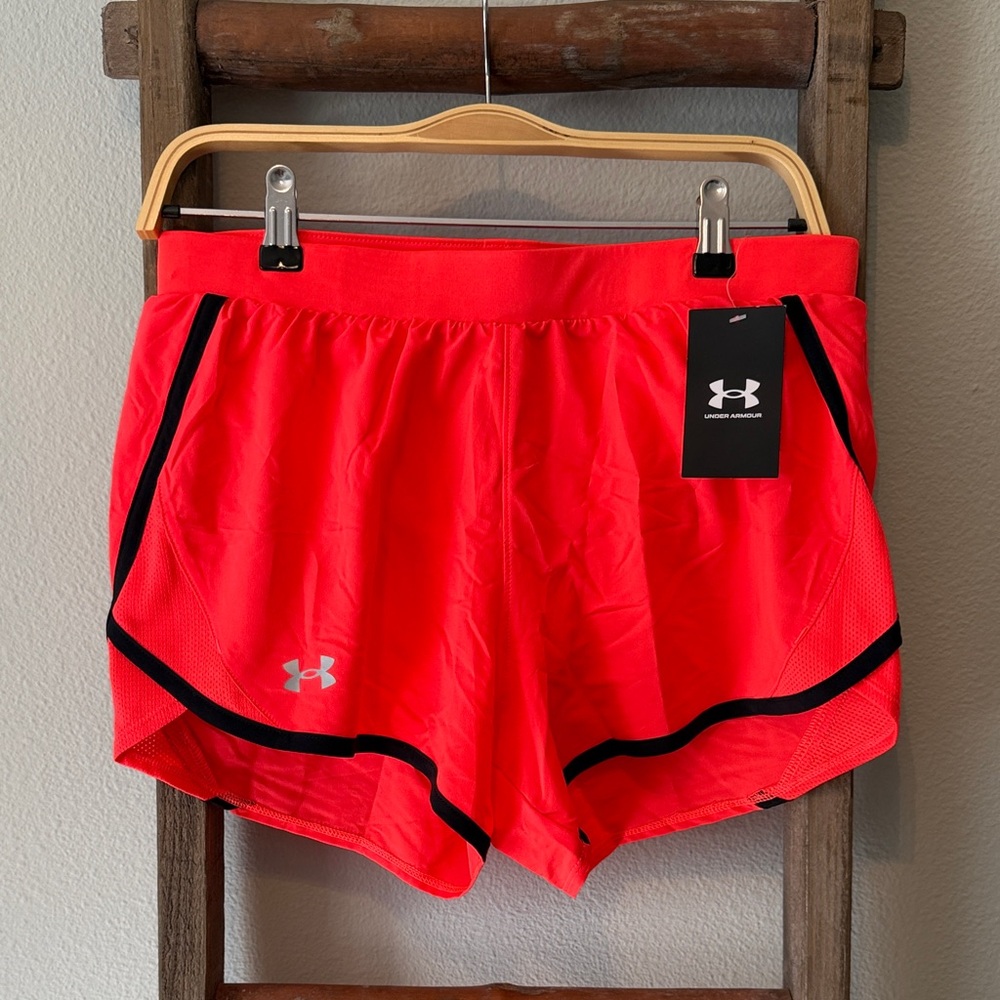 Under Armour Women's Neon Orange Athletic Shorts with Black Trim